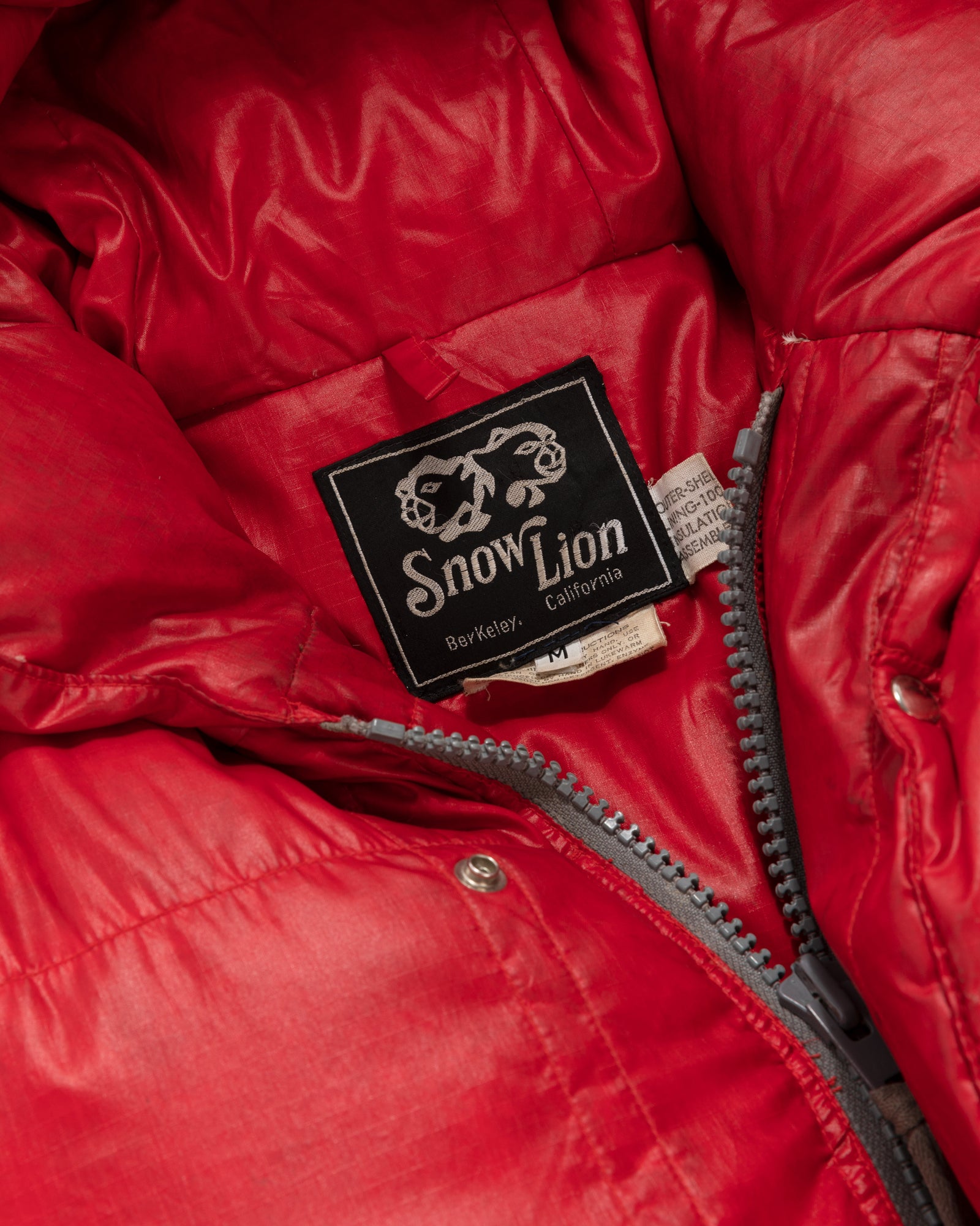 Snow Lion Hooded Down Jacket