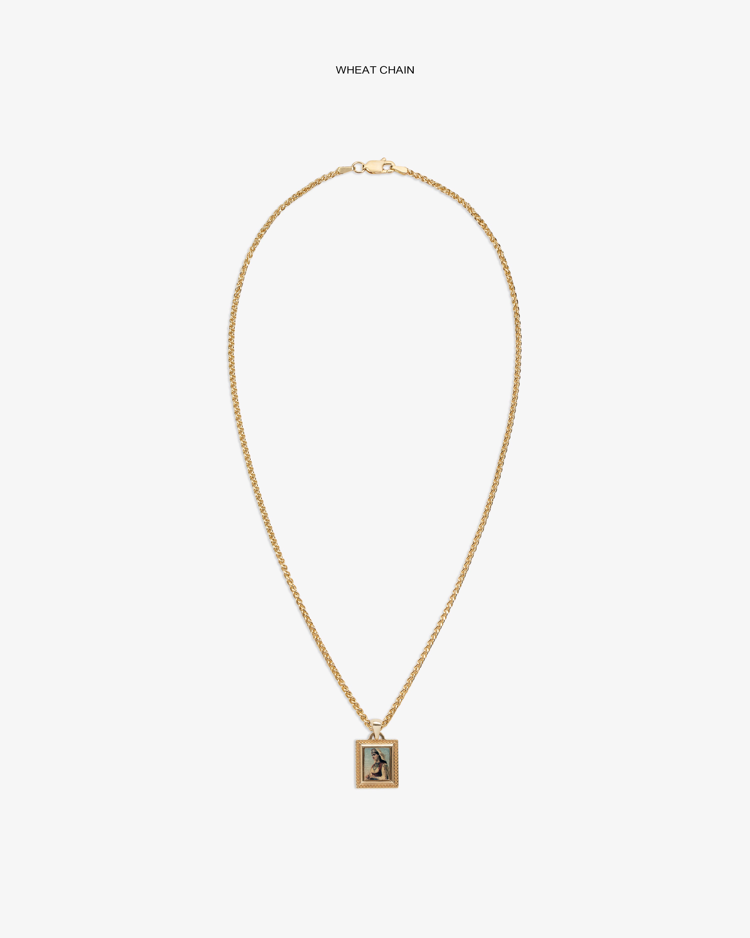 14Kt Gold Pendant: Wheat chain necklace with a rectangular pendant featuring a small center image or design.