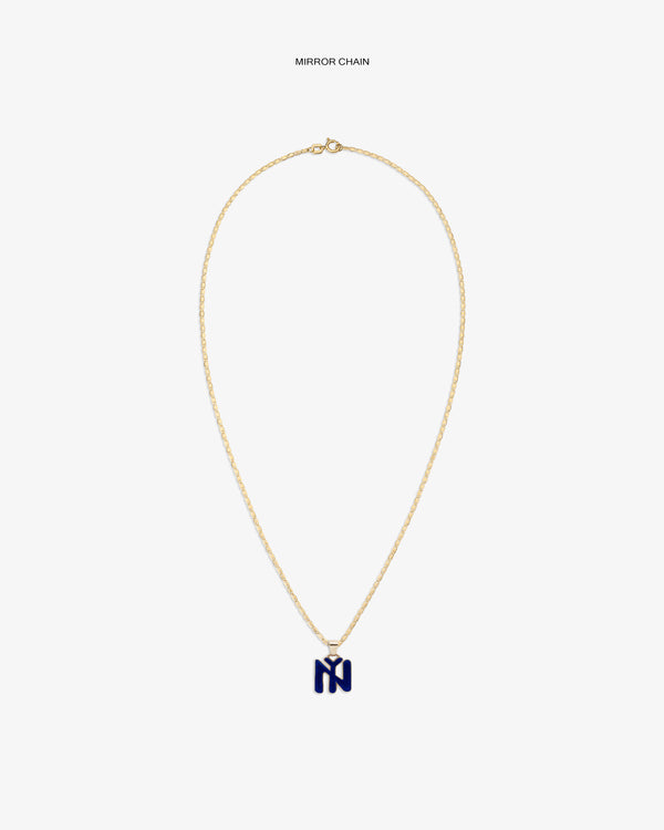 14Kt Gold Pendant: gold chain necklace with abstract blue pendant on a plain white background.