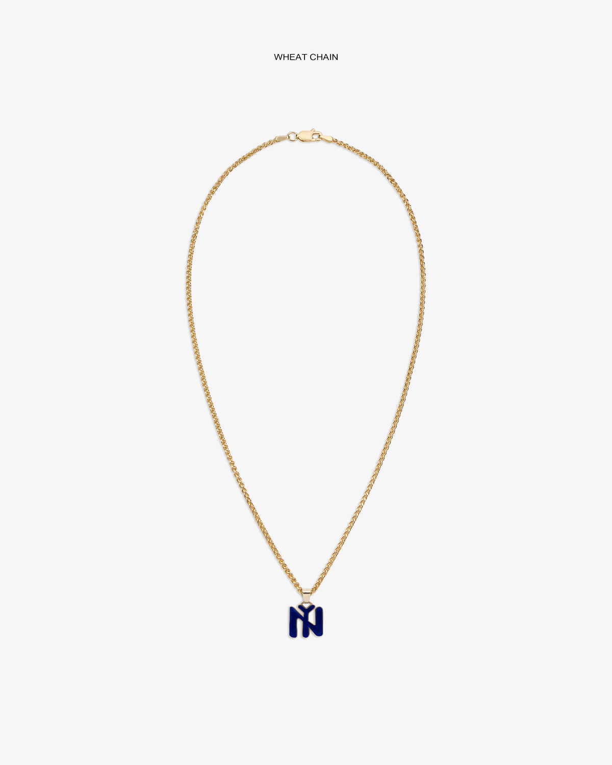 14Kt Gold Pendant: Wheat chain with a blue N-shaped charm on a plain white background.