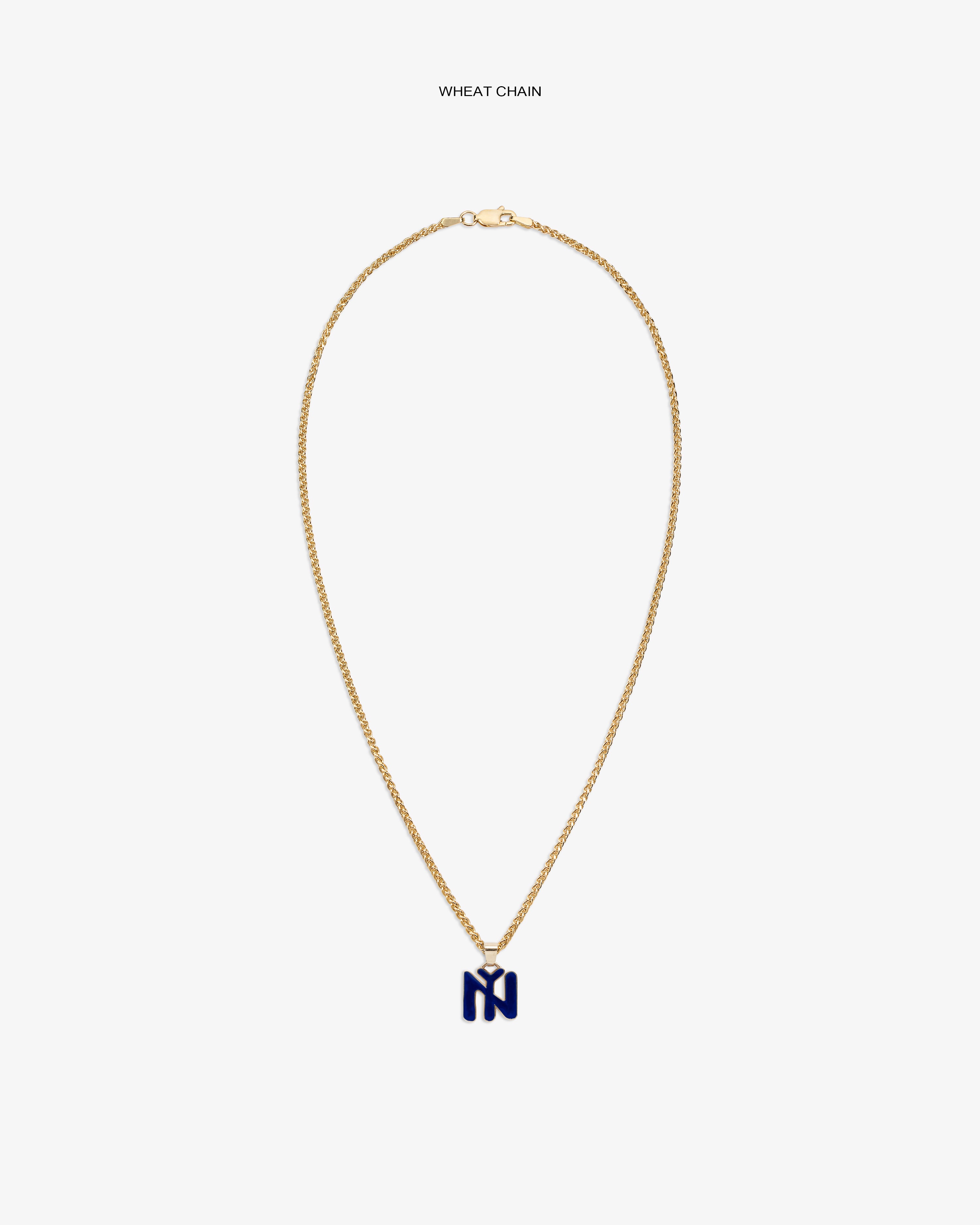 14Kt Gold Pendant: Wheat chain with a blue N-shaped charm on a plain white background.
