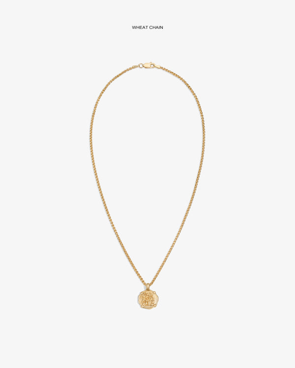 14Kt Gold Coin Pendant on a wheat chain shown against a white background.