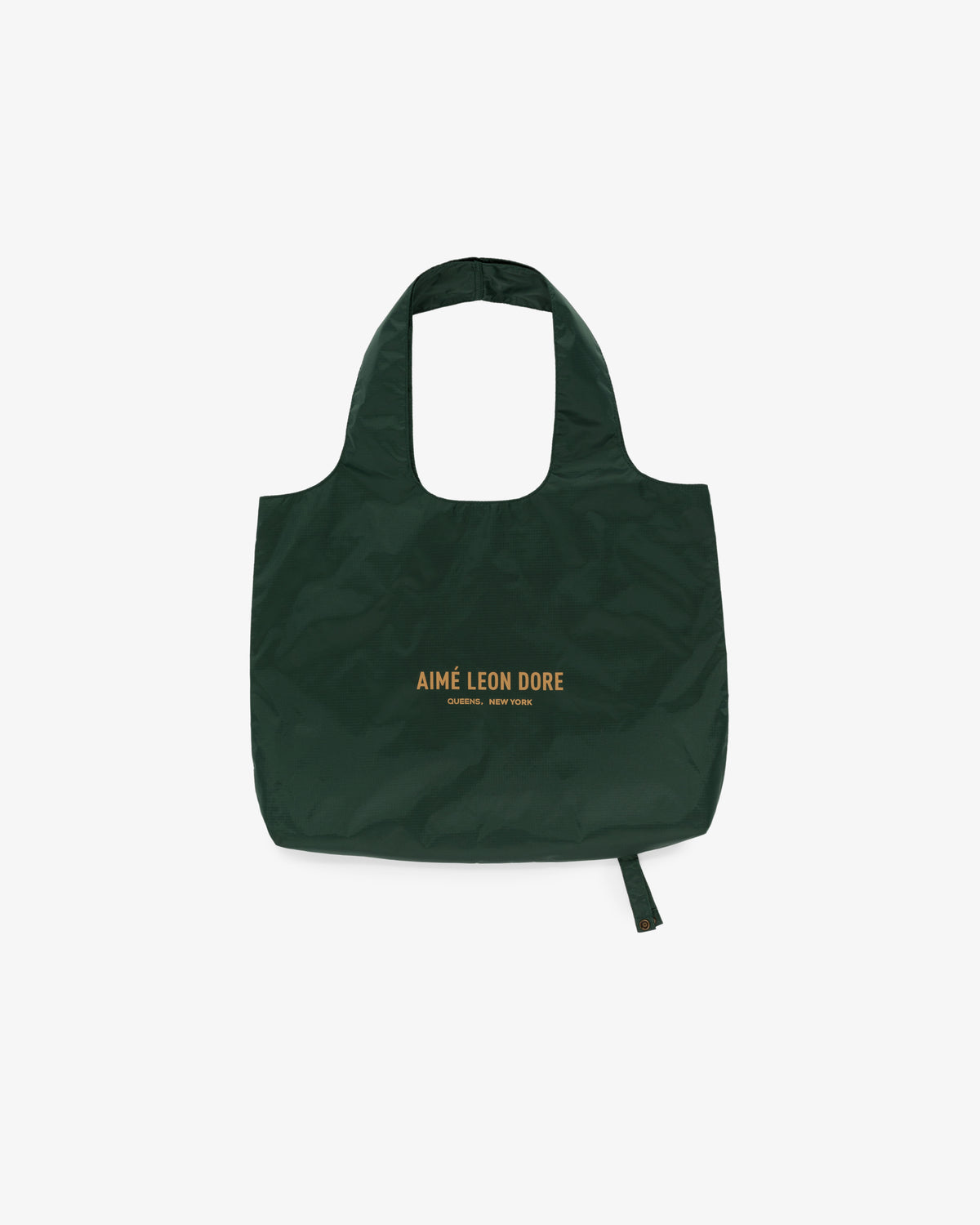Dark green Packable Tote with yellow AIMÉ LEON DORE text on front, displayed against a white background.