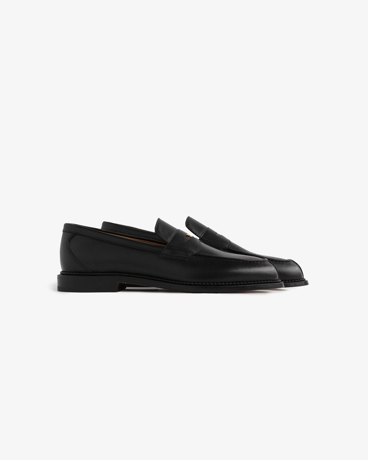 Queens Crest Loafer in black leather with a low heel, shown from the side on a white background.