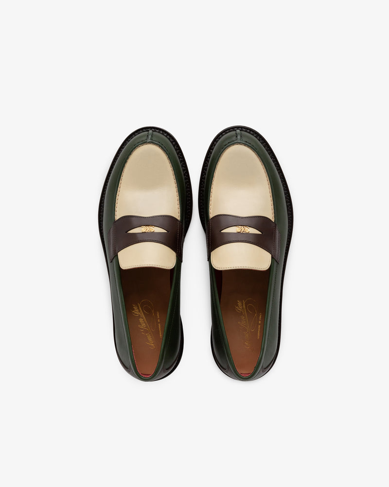 Top view of Queens Crest Loafer in cream, brown, and green leather with gold strap detailing.