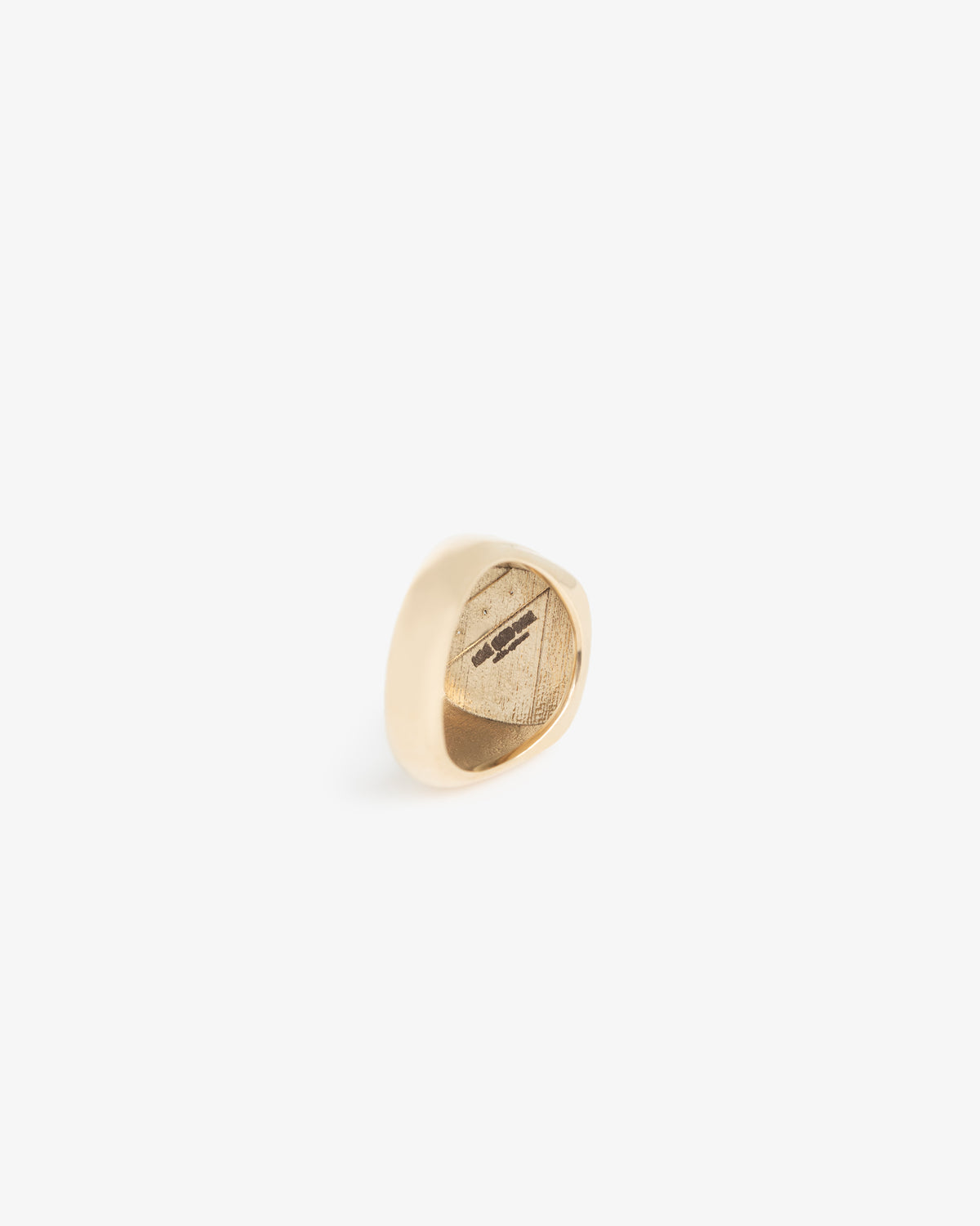 A 14Kt Gold Diamond Signet Ring is shown on a white background, featuring an engraved design on its flat surface.