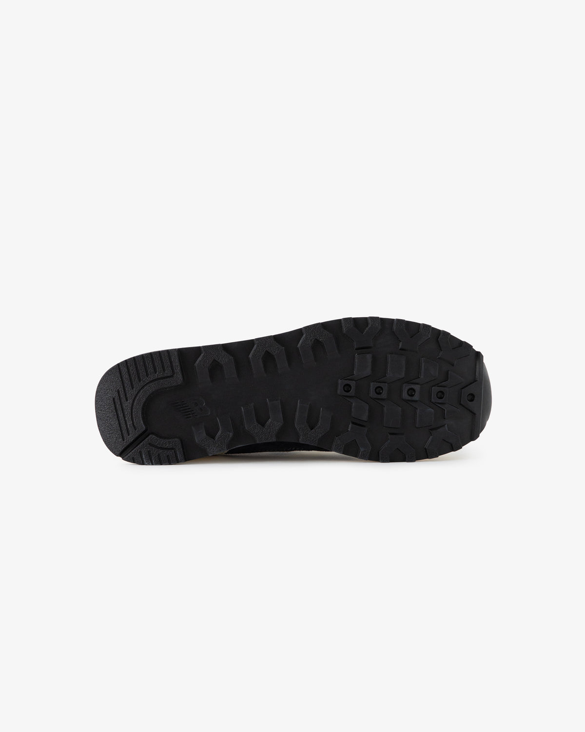 ALD / New Balance 475 black rubber sole with textured tread, shown from the bottom on a white background.