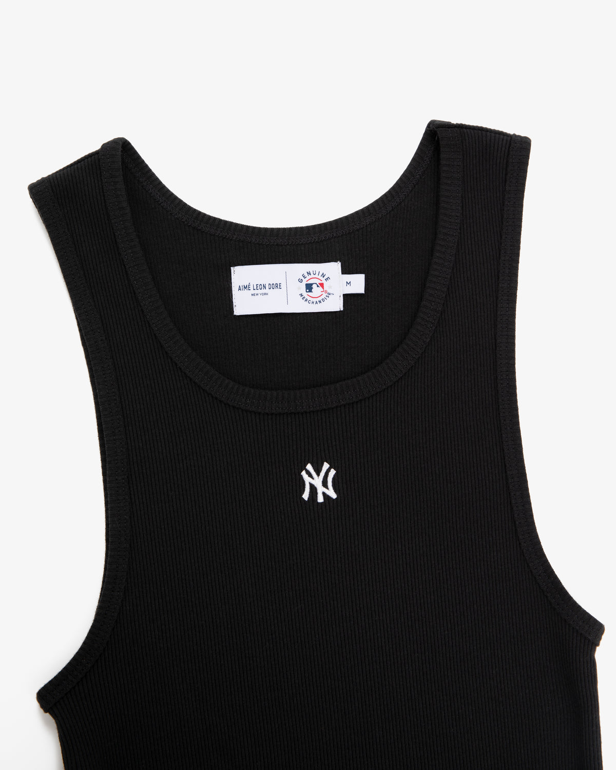 Yankees Tank Top: Black ribbed tank with a small white Yankees logo embroidered on the chest, shown on white.