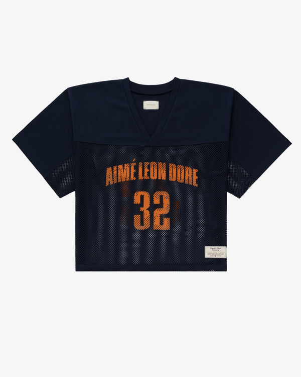 Navy blue mesh SS23 Car Keys jersey with AIMÉ LEON DORE and orange number 32 on the front.