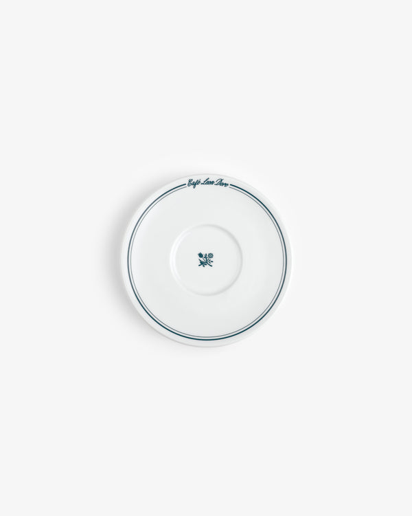 Café Leon Dore saucer: white ceramic with a blue rim, blue flower, and script. Set of 6 cappuccino cups & saucers.