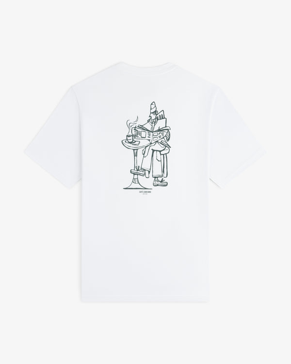 Café Leon Dore Caricature Tee: White T-shirt featuring a line art of a person reading with coffee on the back.