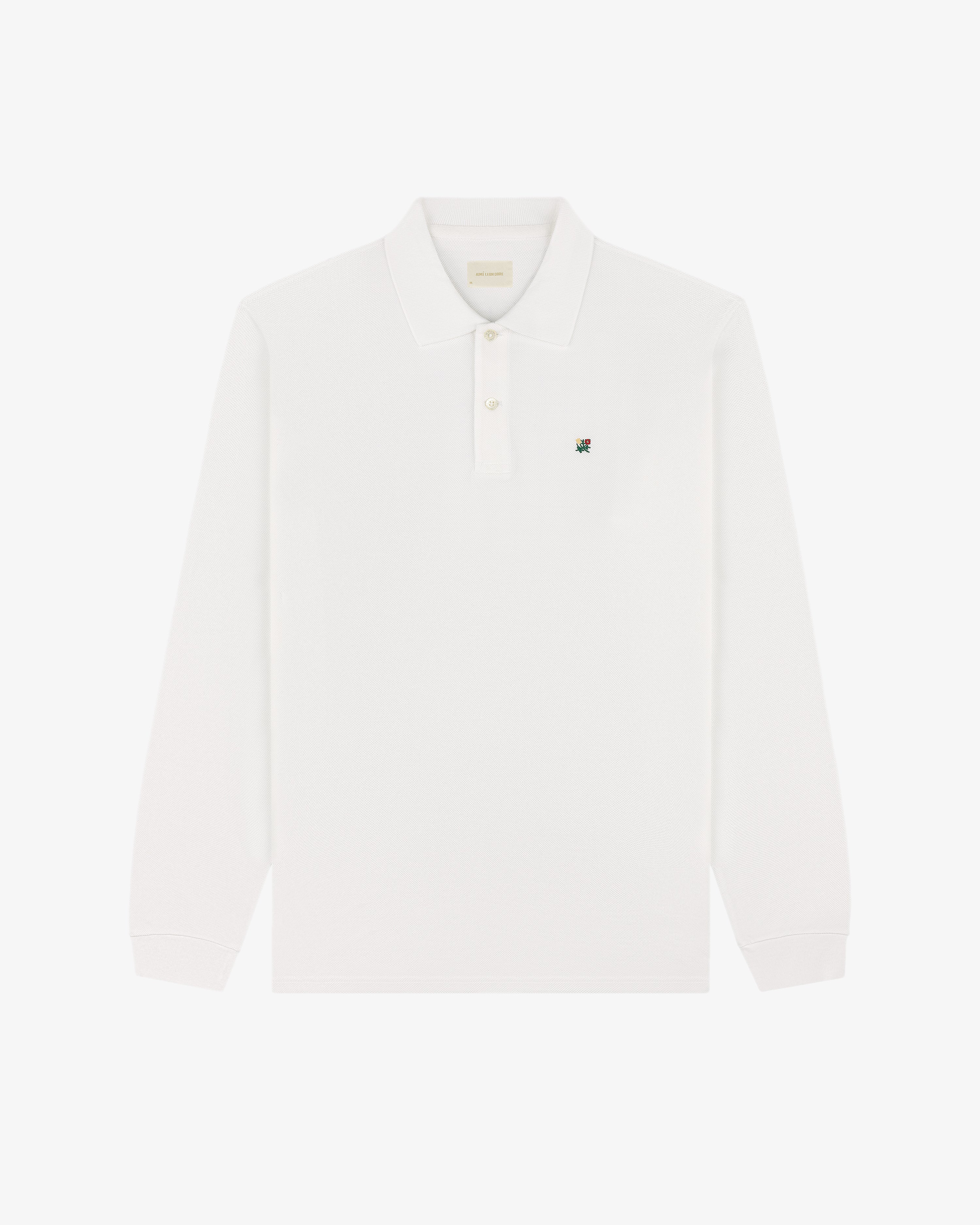 White Long-Sleeve Crest Piqué Polo with collar and small green embroidered logo on the left chest.