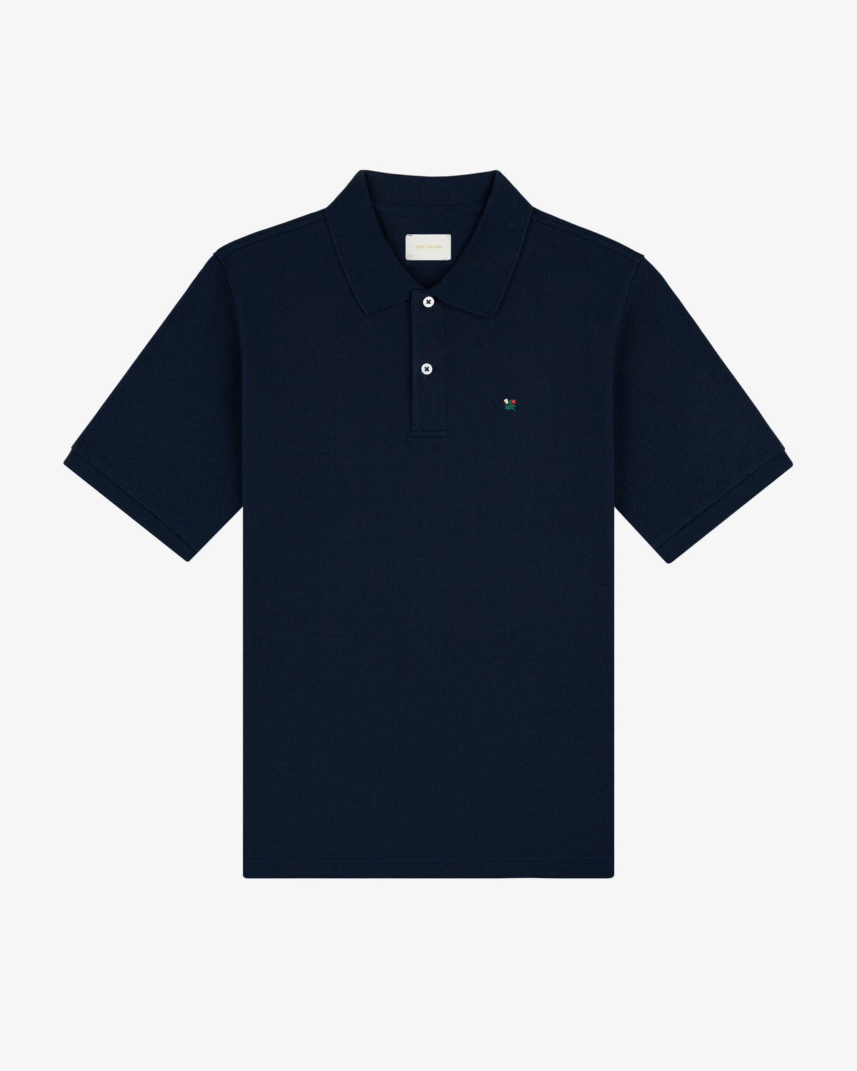 Crest Piqué Polo: Navy short-sleeve, collared shirt with two buttons and a small embroidered chest logo.