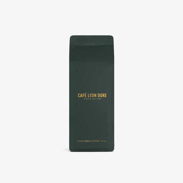 Dark green bag with yellow ALD Espresso Beans text; WHOLE BEAN COFFEE 12 OZ at the bottom.