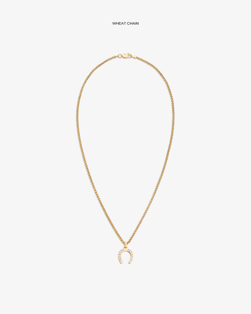 Diamond Horseshoe Pendant on a gold wheat chain, shown against a plain white background.