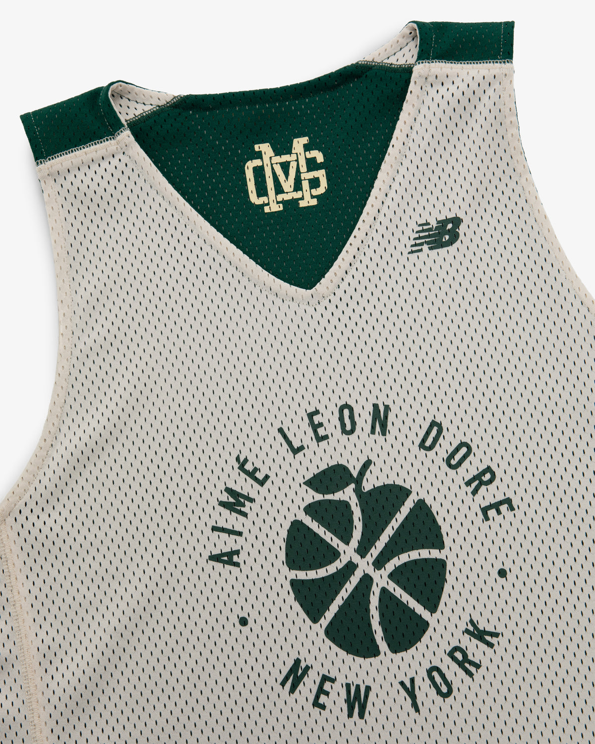 The ALD / New Balance SONNY NY Reversible Jersey is beige mesh with green trim and NY graphic on the chest.