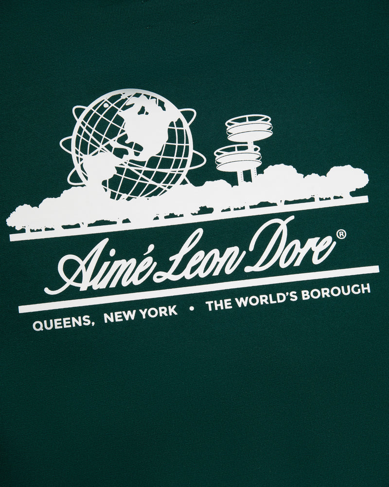 White graphics and The Worlds Borough text on green Unisphere Crewneck Sweatshirt by Aimé Leon Dore, Queens, New York.