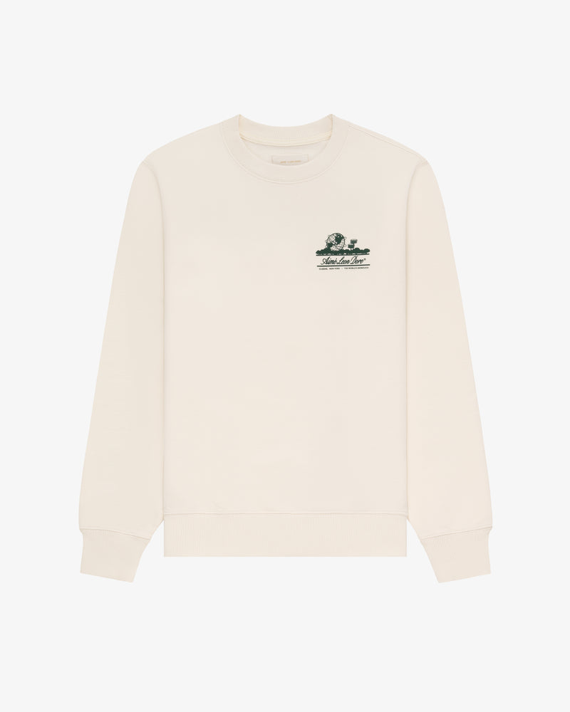 Unisphere Crewneck Sweatshirt in beige with small green graphic and text on left chest, shown laid flat on white.