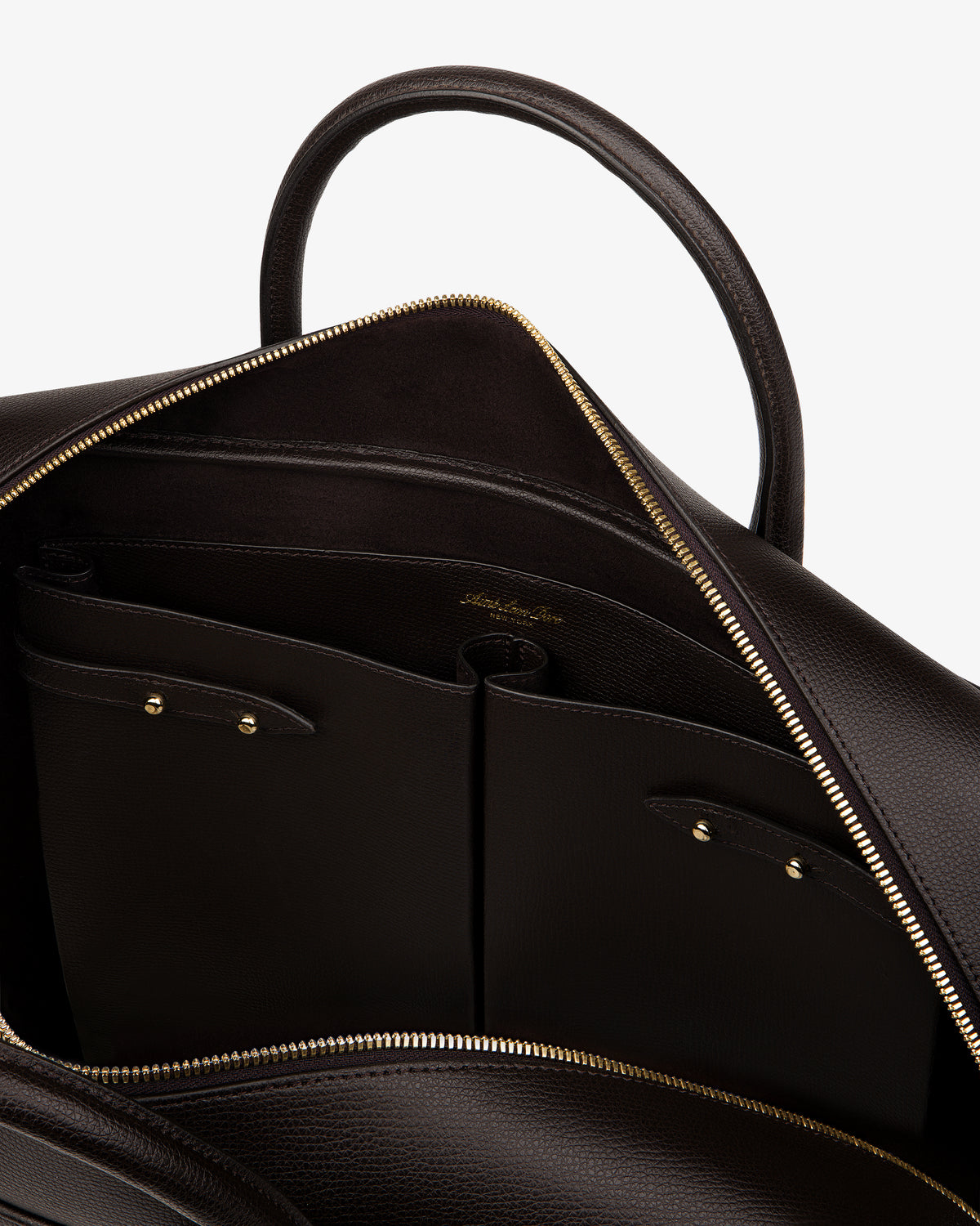 Open Full Grain Leather Briefcase Duffle with gold zipper, showing interior pockets and embossed logo.