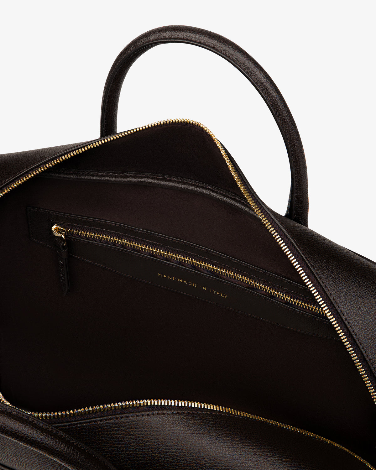 Open Full Grain Leather Briefcase Duffle showing interior zip pocket, gold zipper, and "Handmade in Italy" embossed lining.