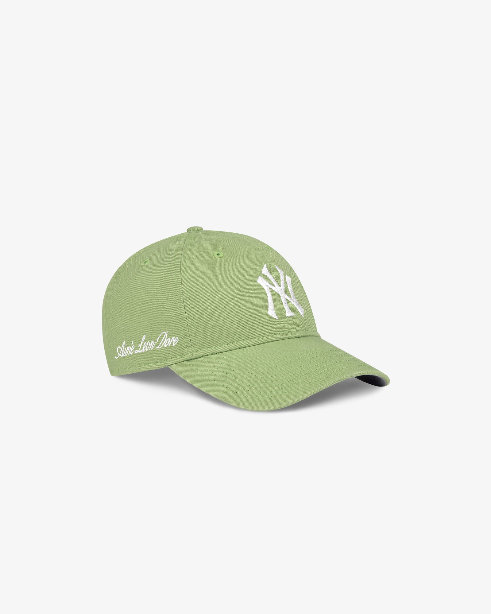 Light green ALD / New Era Yankees Ballpark Hat with white NY logo and Aimé Leon Dore text on the side.