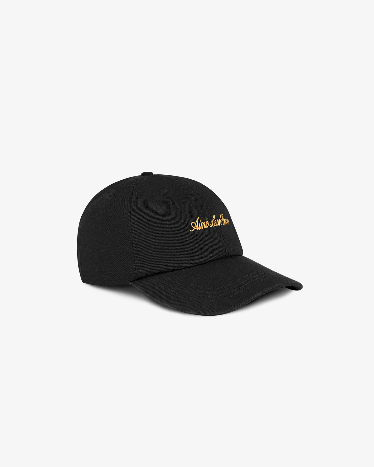 Washed Script Hat—black cap with curved brim and yellow script embroidery on the front, shown on plain background.