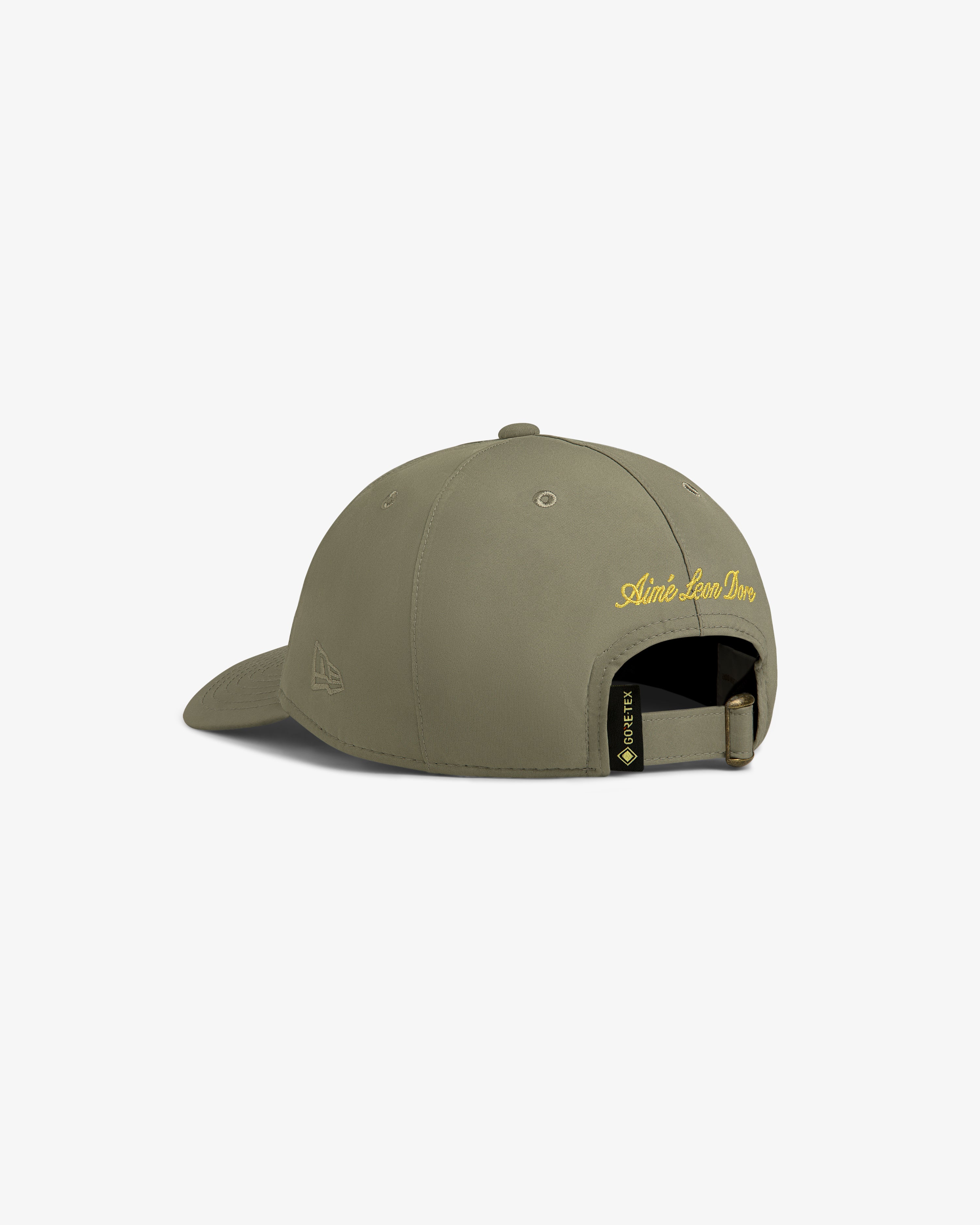 Olive green GORE-TEX Unisphere Hat, back view, with yellow script and adjustable strap.