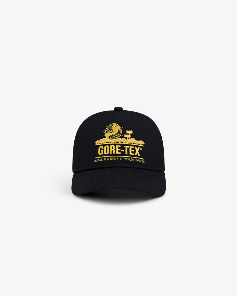 The GORE-TEX Unisphere Hat is a black cap with a yellow globe and buildings graphic plus GORE-TEX text on the front.