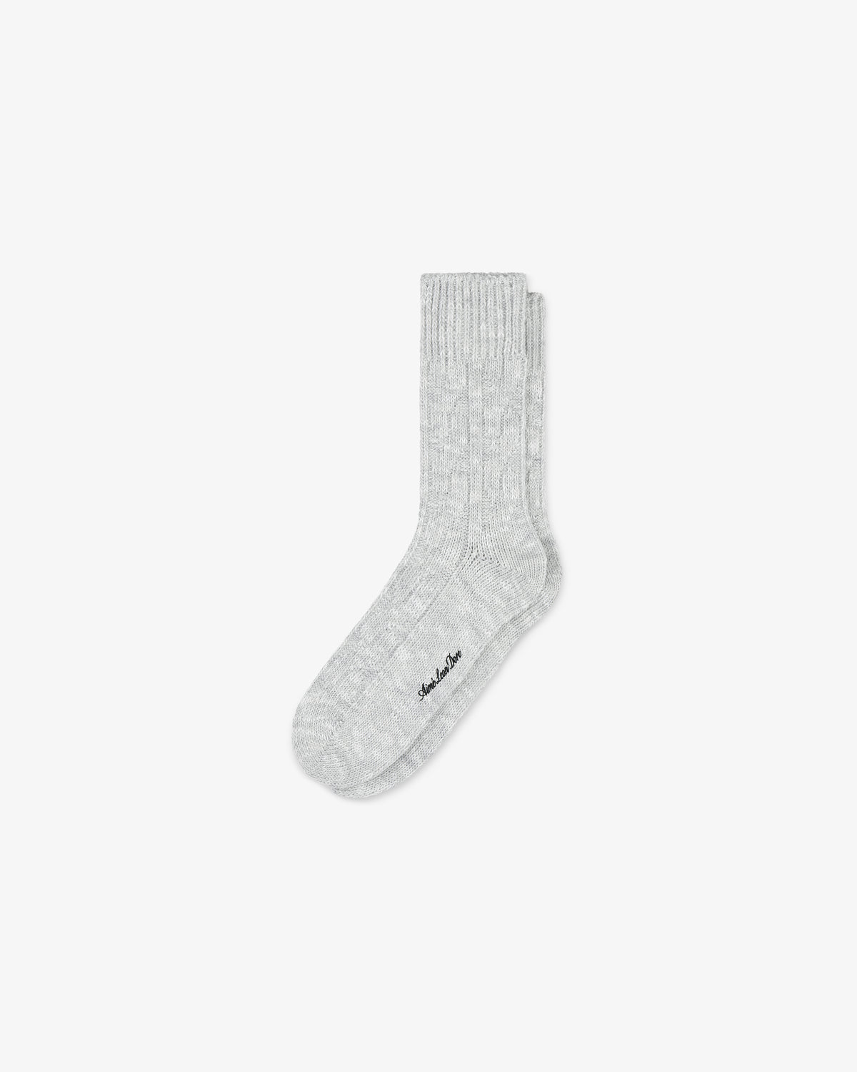 Single cable knit hiking sock in light gray, with subtle texture, laid flat on a plain white background.