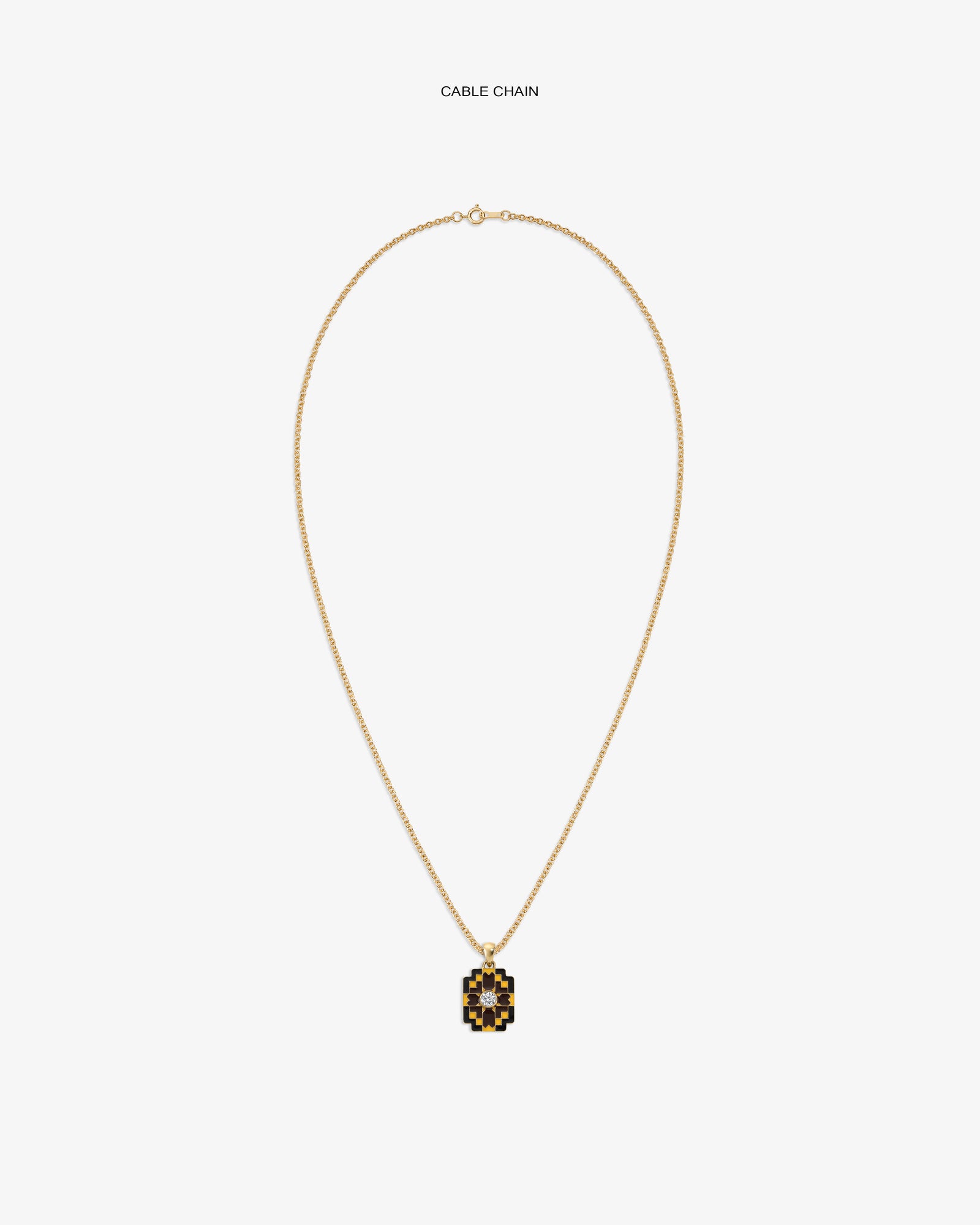 Diamond Mosaic Pendant on a gold cable chain, featuring black and gold, displayed against a white background.