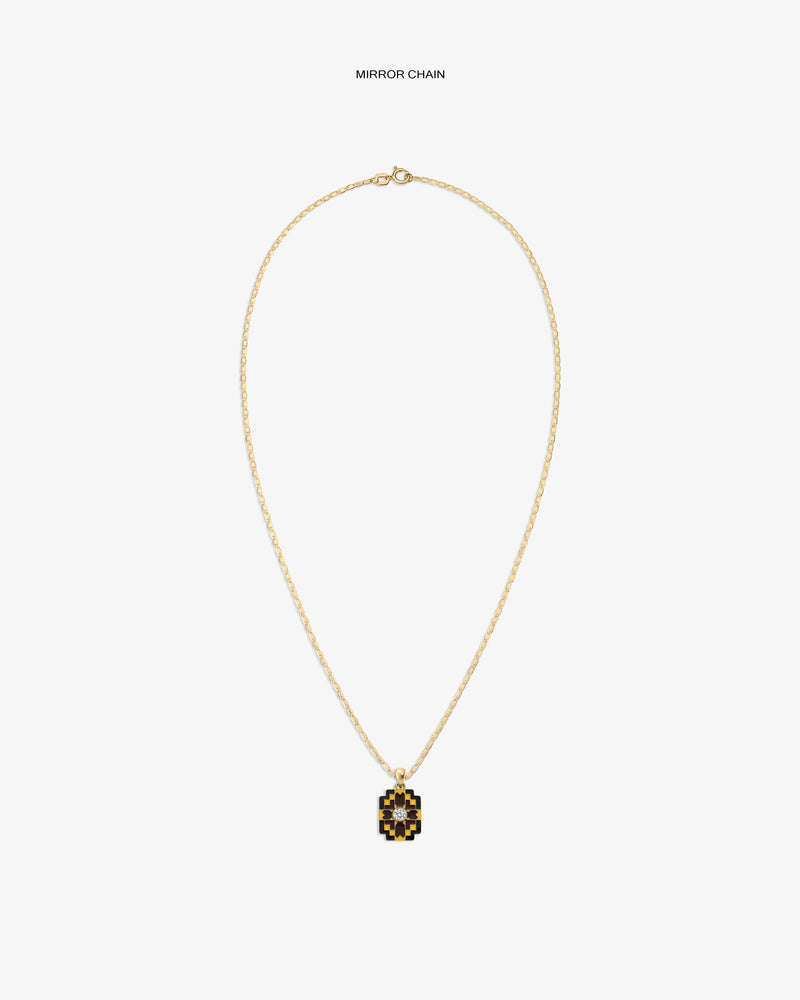 Diamond Mosaic Pendant: a gold chain necklace with a geometric black and gold pendant on white background.