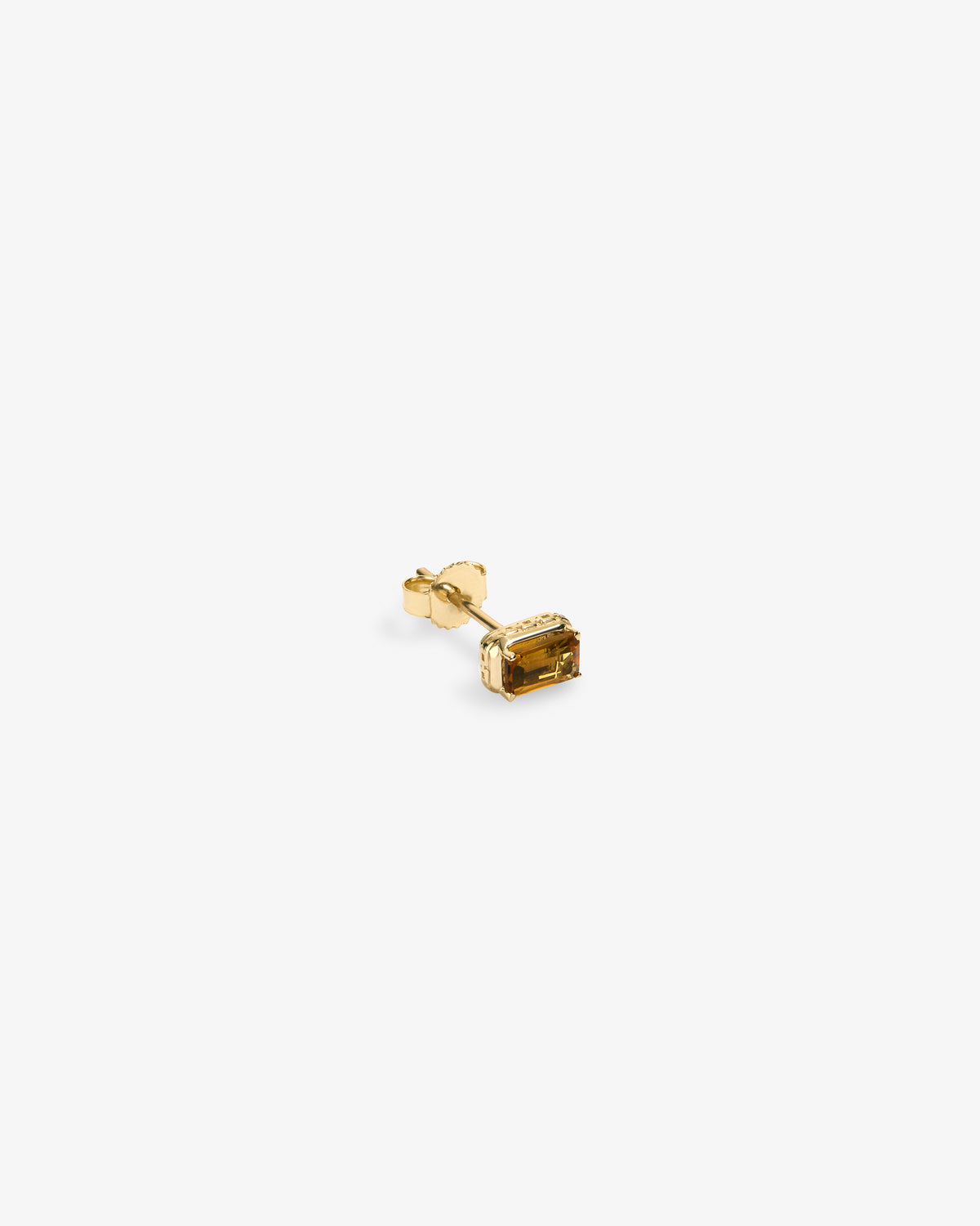 14Kt Gold Citrine Earring: single gold stud with a rectangular baguette-cut yellow gemstone on a white background.