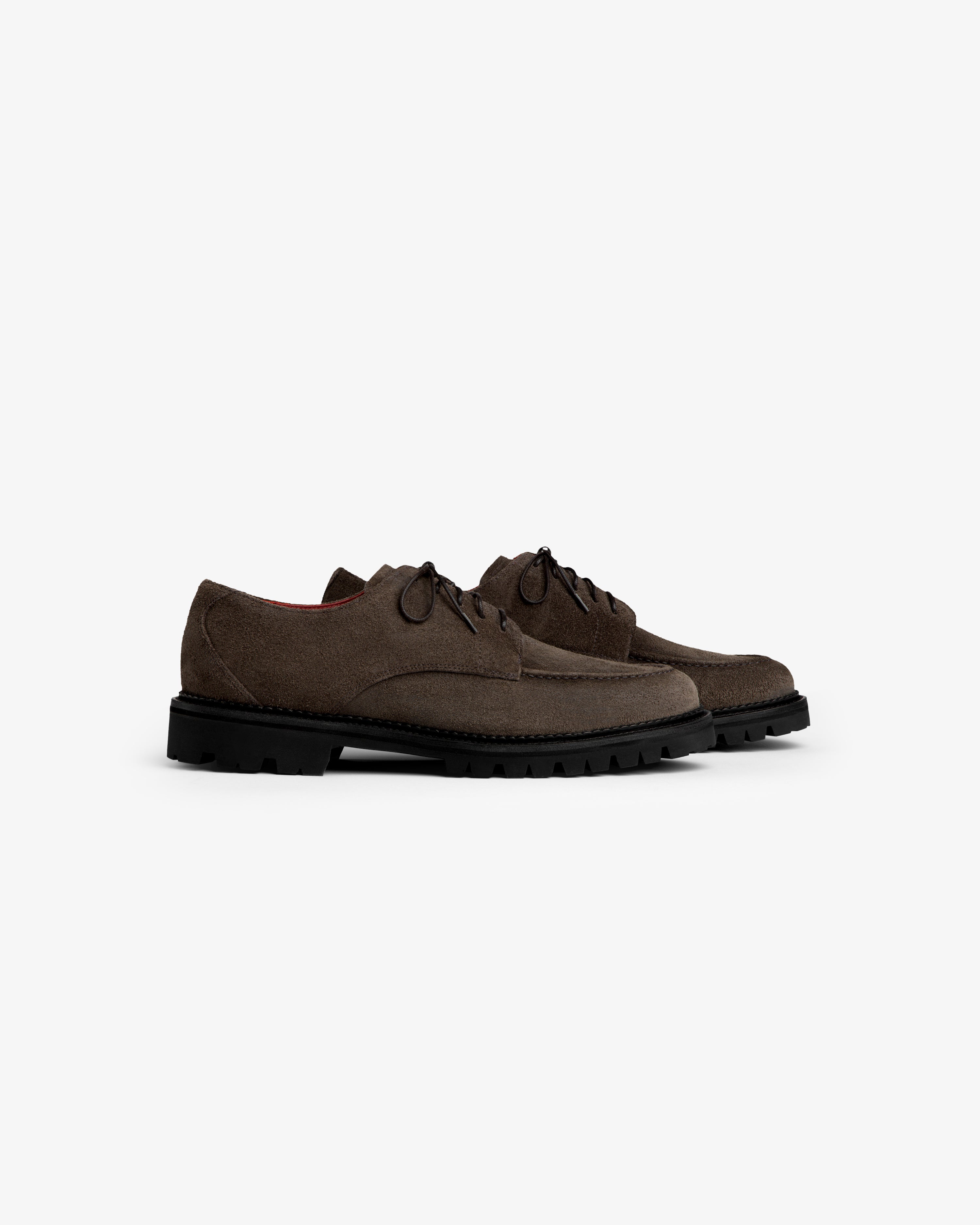 Suede Lug Sole Derby shoes in dark brown suede with thick black lug soles.