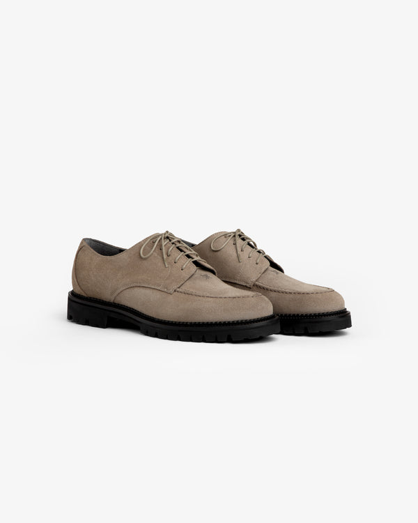 Suede Lug Sole Derby shoes in tan suede with chunky black lug soles and laces.