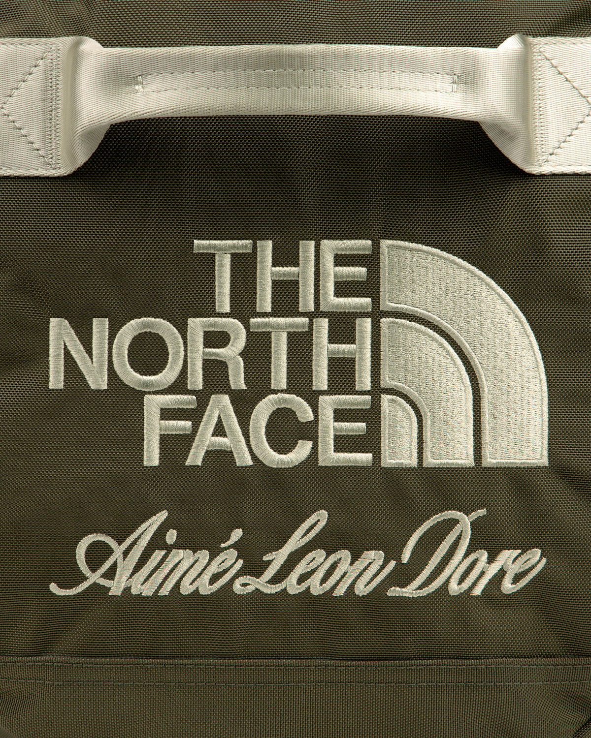 Olive green ALD / The North Face Base Camp Duffel with both brand names embroidered in white.