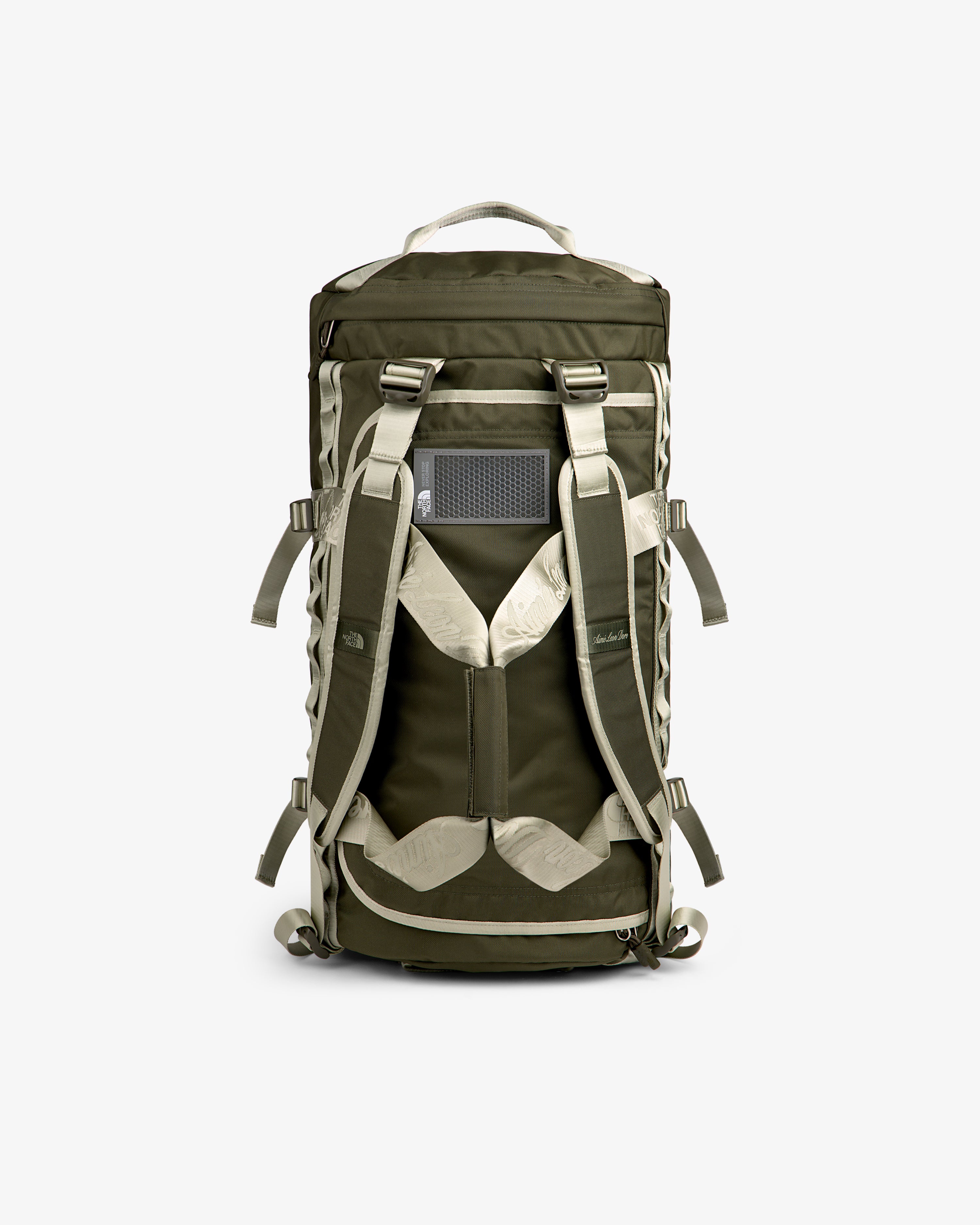ALD / The North Face Base Camp Duffel in olive green and beige with padded straps and top handle.