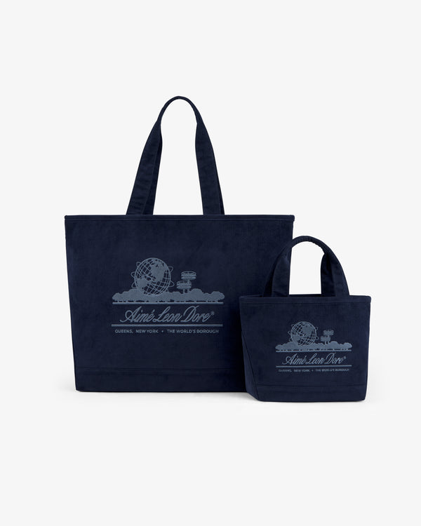 Two navy corduroy tote bags, including a Large Corduroy Unisphere Tote Bag, featuring an embroidered globe logo and text.