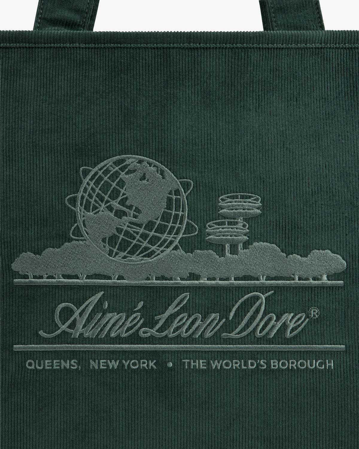 Large Corduroy Unisphere Tote Bag in dark green, featuring an embroidered globe, towers, and Aimé Leon Dore branding.