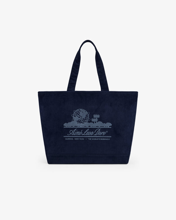 Large Corduroy Unisphere Tote Bag in dark navy, featuring an embroidered globe icon and logo text on the front.