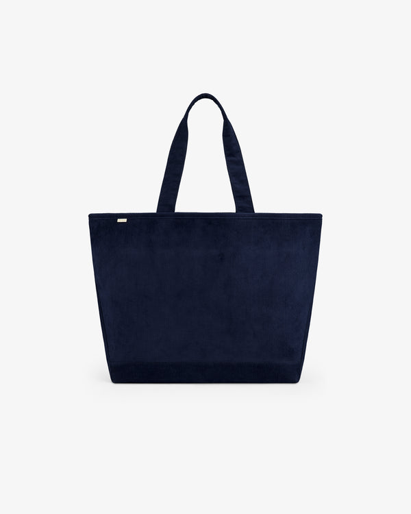 Large Corduroy Unisphere Tote Bag in navy blue with two shoulder straps.