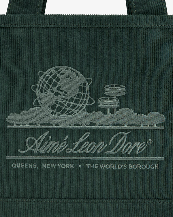 Mini Corduroy Unisphere Tote Bag in dark green with an embroidered globe and cityscape logo reading Aimé Leon Dore.