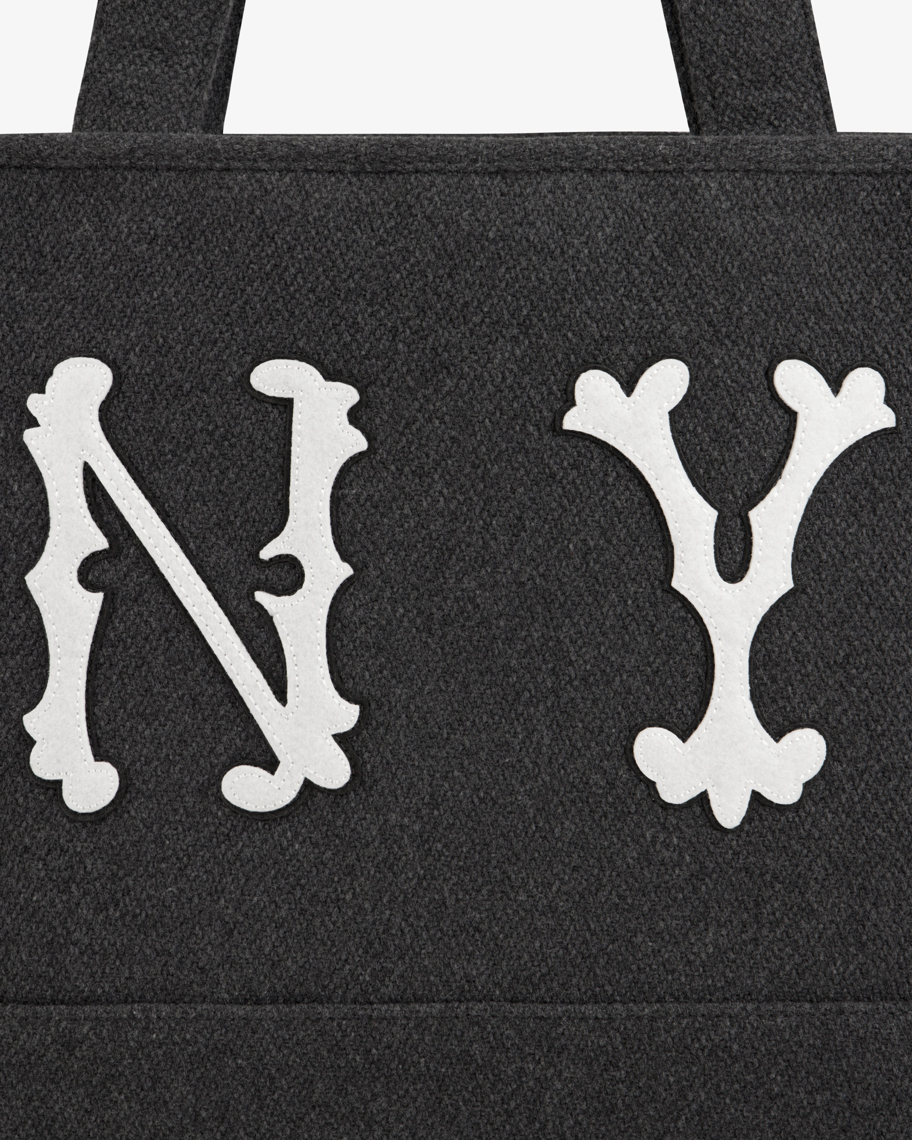Dark grey wool NY Highlanders Wool Tote Bag with white NY lettering in a decorative font.