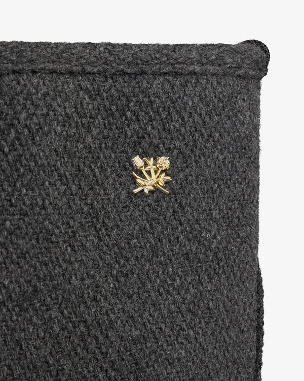 NY Highlanders Wool Tote Bag in dark gray wool featuring a gold-toned metal flower pin.