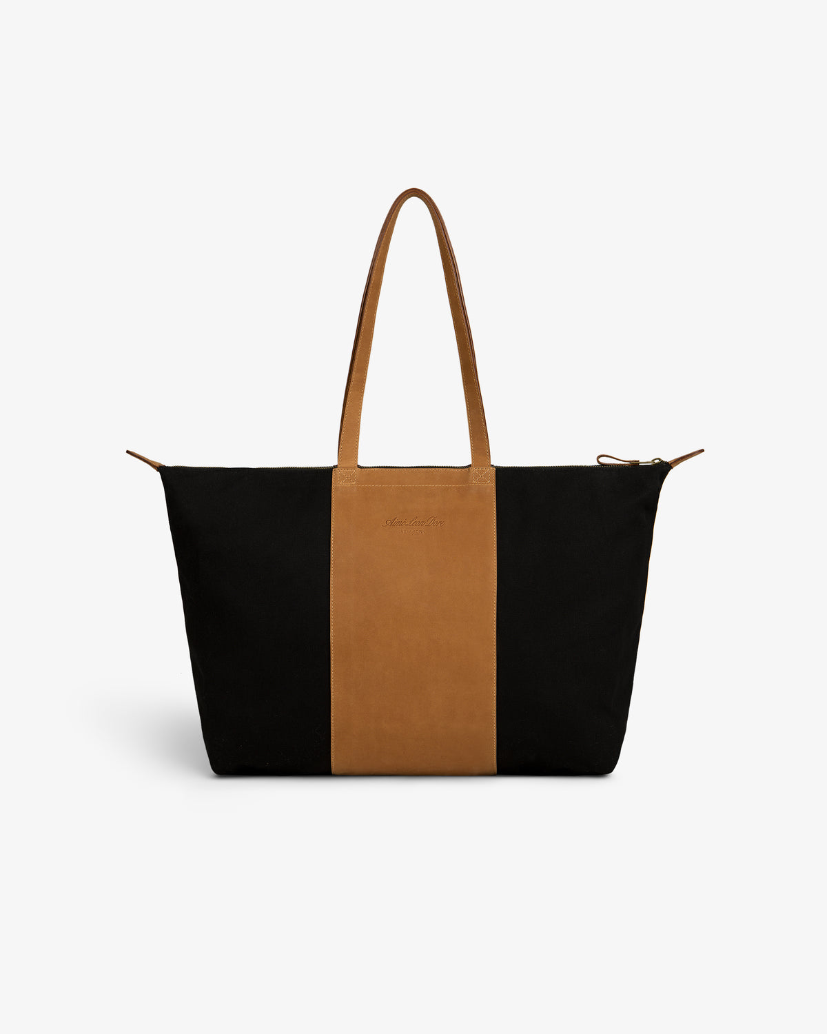 Leather Canvas Zip Tote in black and brown with two handles, displayed on a plain white background.