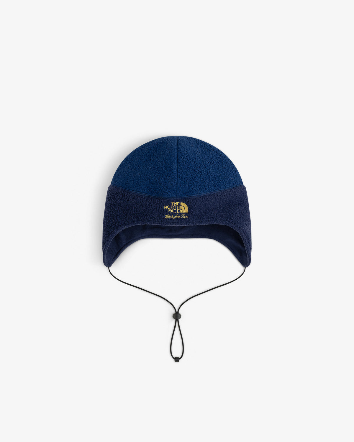 ALD / The North Face blue fleece earflap hat with drawstring, top view on white background.