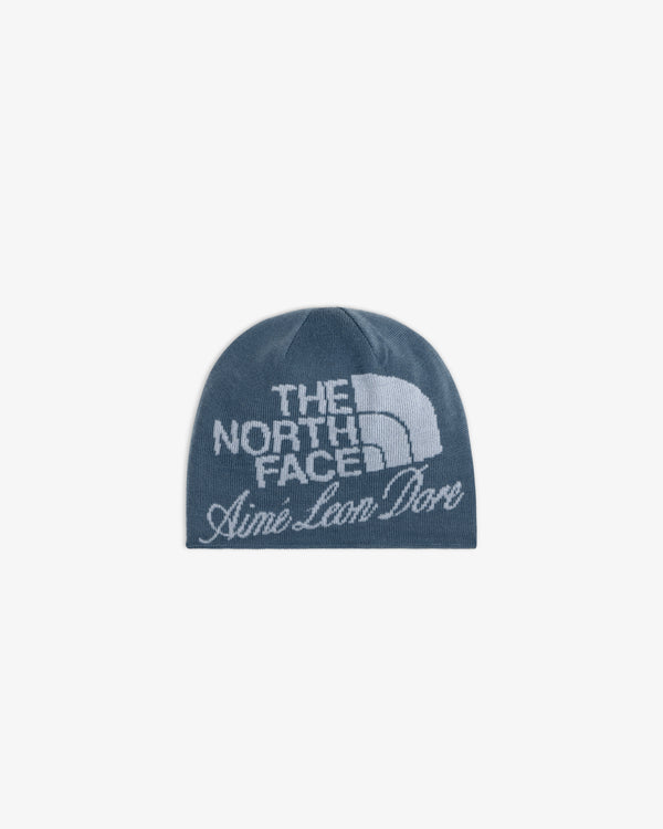 Blue ALD / The North Face Jacquard Beanie with both brands’ logos in white on the front.