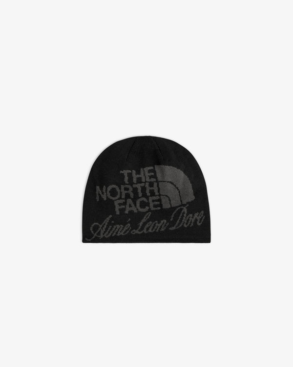ALD / The North Face Jacquard Beanie in black with both brands’ logos in dark grey on the front.