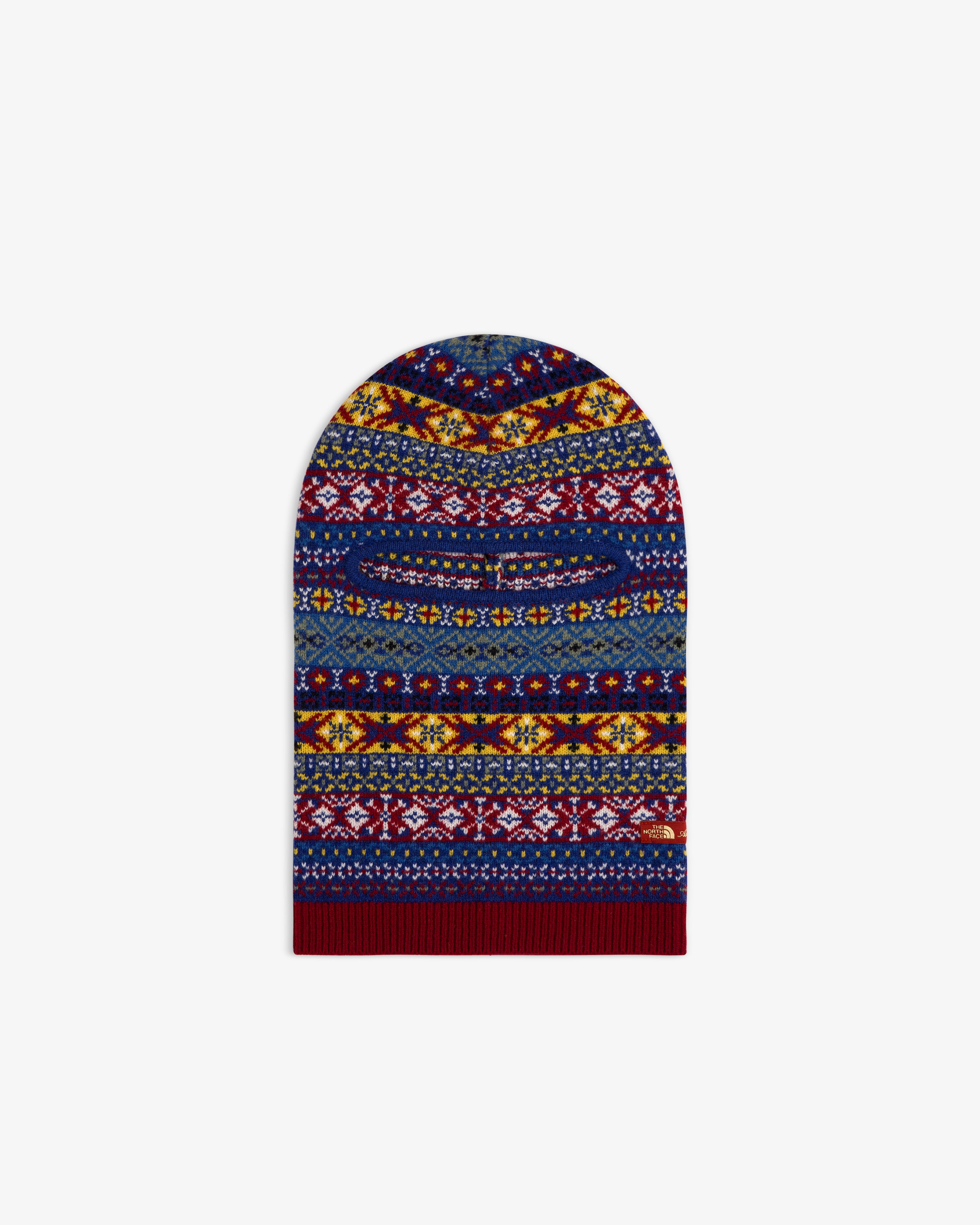 ALD / The North Face Fair Isle Balaclava with vibrant blue, red, yellow, and white horizontal knit patterns.