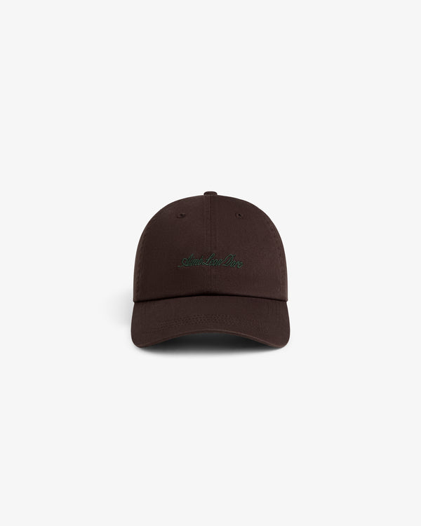 Washed Script Chino Hat in dark brown with green embroidered text, shown on a plain white background.