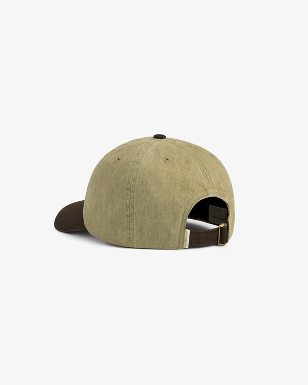 Pigment Dyed Logo Hat in khaki with a dark brown brim, shown from the back with adjustable strap and buckle.